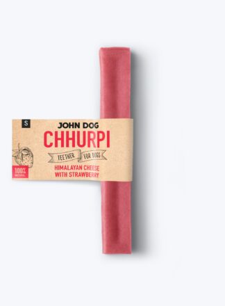 Das Foto zeigt einen Himalaya-Käse für Hunde mit Erdbeergeschmack, rosa Farbe und Größe S, mit der Aufschrift "John Dog Chhurpi - Himalaya-Käse mit Erdbeere".