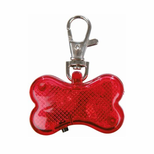 Rotes Signallicht in Form eines Knochens für deinen Hund, mit der Möglichkeit, es mit einem Metallkarabinerhaken am Halsband zu befestigen. Entwickelt, um die Sichtbarkeit bei Spaziergängen in der Dunkelheit zu erhöhen. Auf einer Seite des Lichts ist Platz, um die Kontaktdaten des Halters zu notieren.