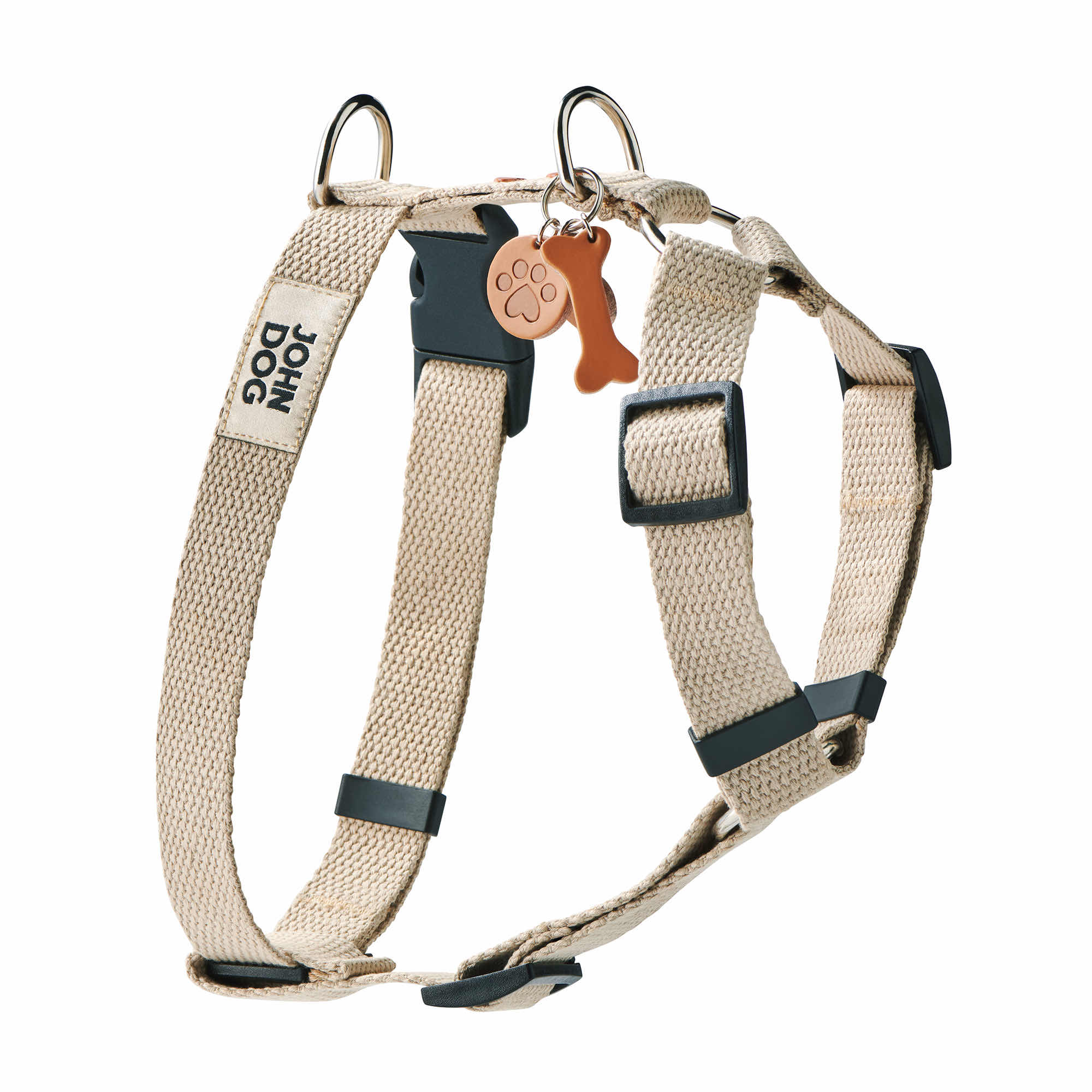 Beigefarbenes Schutzgeschirr mit Schlüsselring aus Leder mit Knöchel, Hundepfote und Herz und herzförmigen Nieten in Braun. Produkt aus der MANIFEST-Kollektion von John Dog.