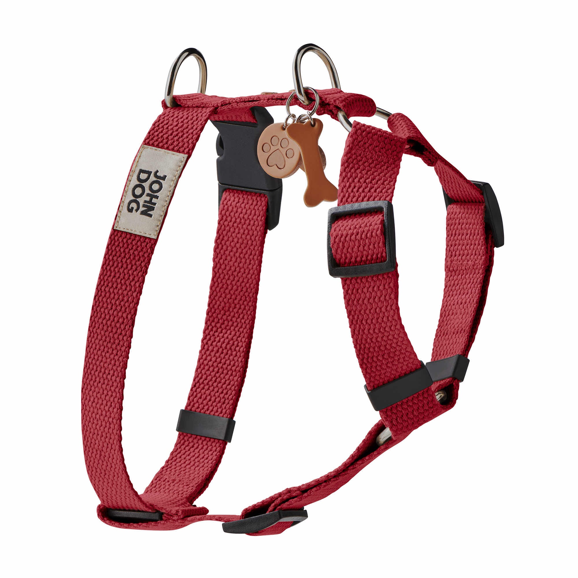 Kastanienbraunes Schutzgeschirr mit Schlüsselring aus Leder mit Knöchel, Hundepfote und Herz und herzförmigen Nieten in Braun. Produkt aus der MANIFEST Kollektion von John Dog.