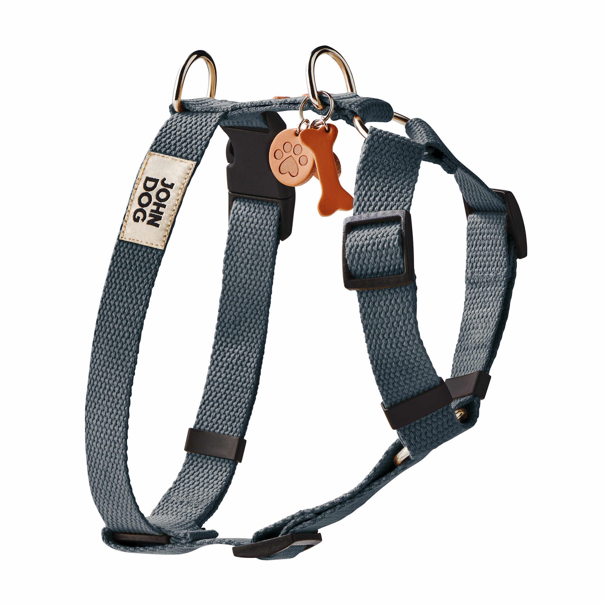 Marineblaues Schutzgeschirr mit Schlüsselring aus Leder mit Knöchel, Hundepfote und Herz und herzförmigen Nieten in Braun. Produkt aus der MANIFEST Kollektion von John Dog.